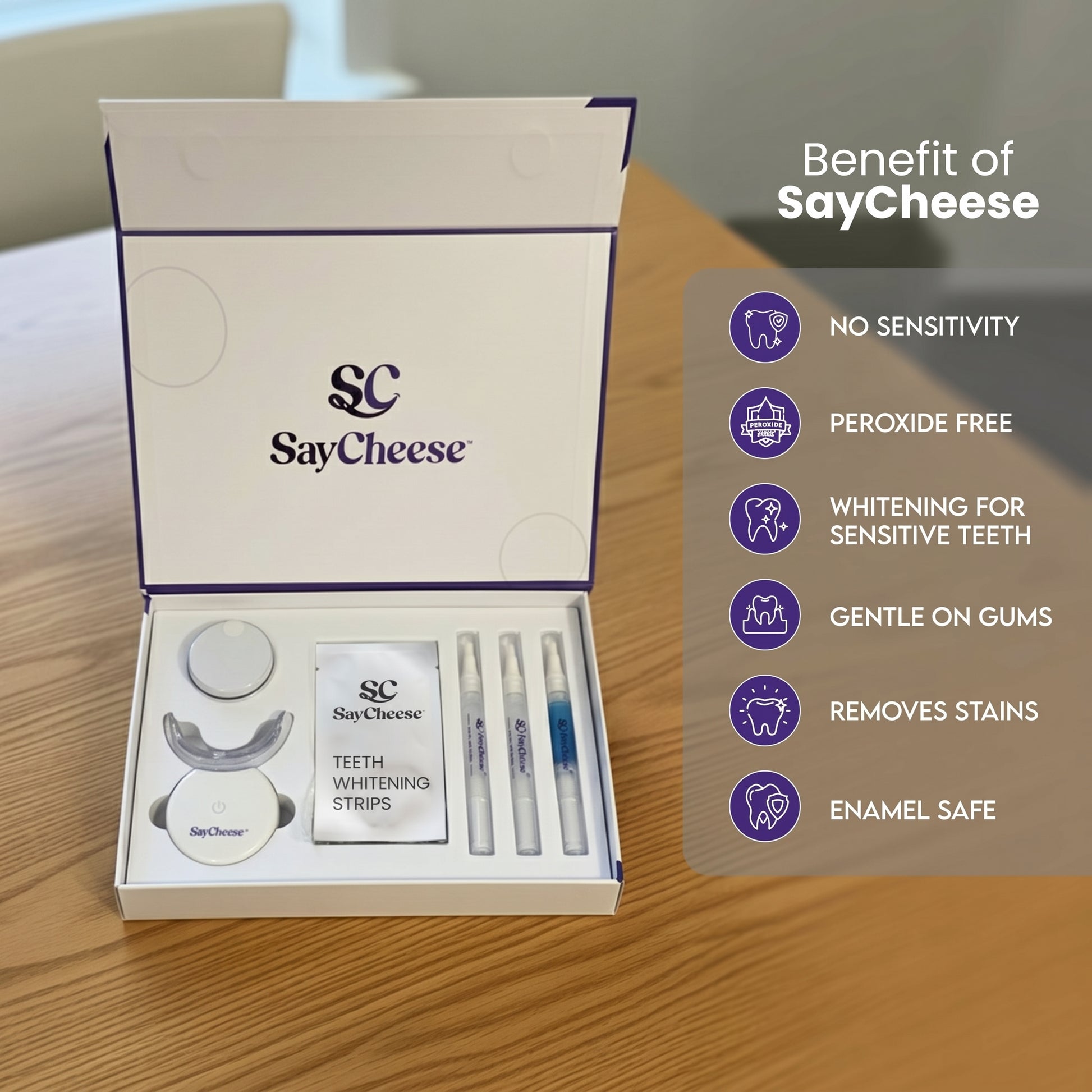 SayCheese teeth whitening kit with packaging on a wooden surface and Benefits of ASCEND Radiant Whitening System